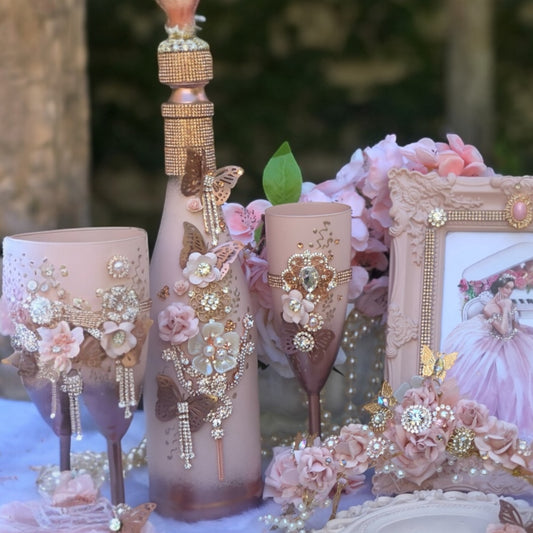 Custom champagne bottle with two glasses in blush , rose gold color